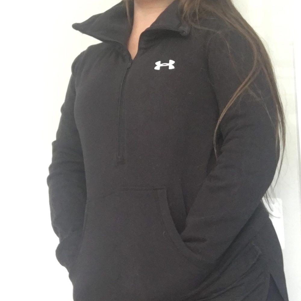 a black under armour tunic half-zip